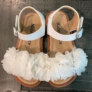 These are the cutest little white sandals. Size 6
